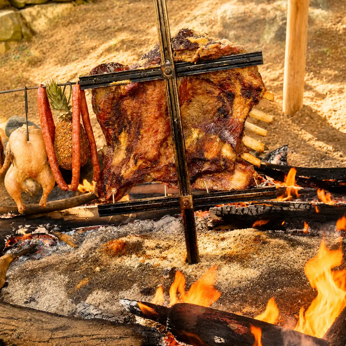 Costela no fogo de chão assando lentamente
